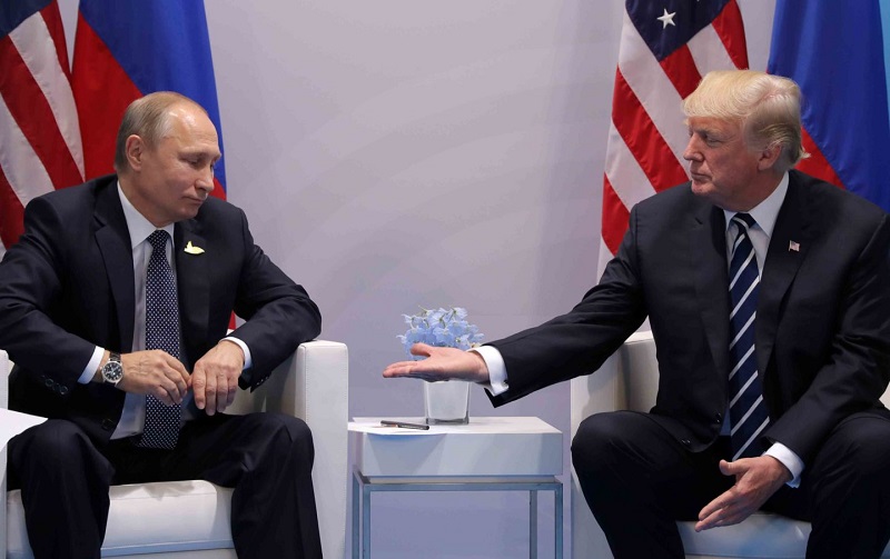 Putin trump handshake rtr